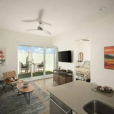 Brightly lit interior of a living space with outdoor access