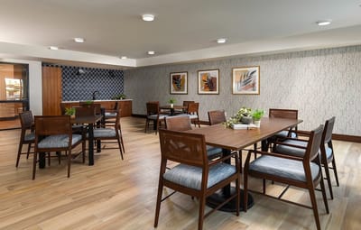 Interior common area with dining tables and chairs