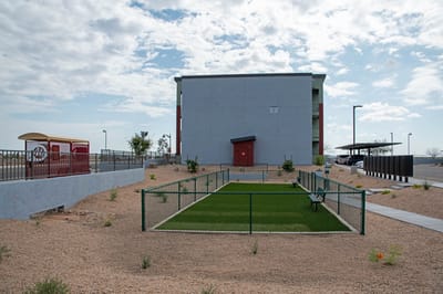Exterior view of the facility with landscaped outdoor area