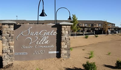 Exterior view of SunGate Villa senior community sign