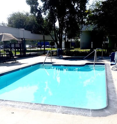 Swimming pool area in an outdoor space