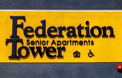 Facility logo displayed on building signage
