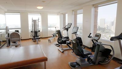 Well-equipped exercise room with various fitness machines