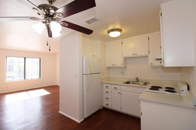 Bright kitchen in a senior apartment with overhead fan