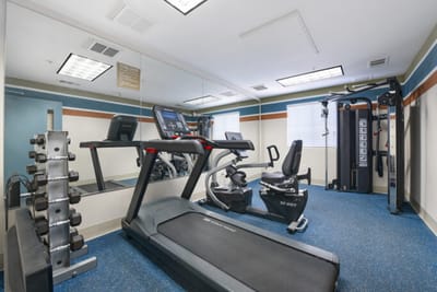 An interior view of a fitness facility with equipment