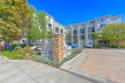 A view of The Grove Senior Apartments building exterior