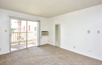 Bright interior view of a living space with a sliding door