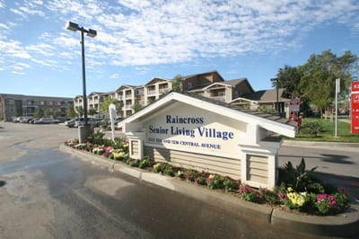 Sign for Raincross Senior Living Village at the entrance
