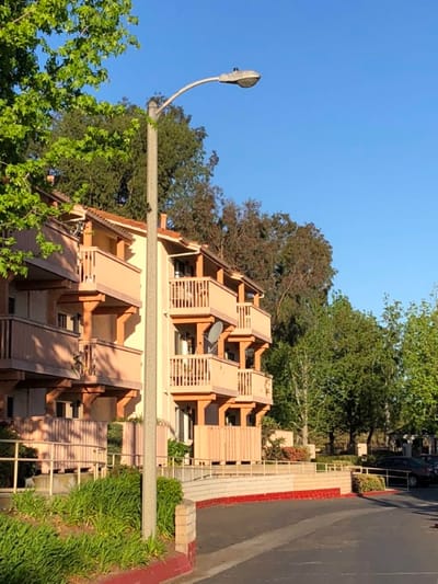 Exterior view of a residential building with balconies