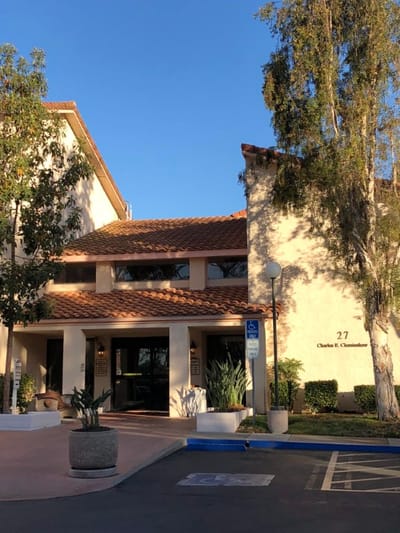 Exterior view of Woodbridge Manor's entrance