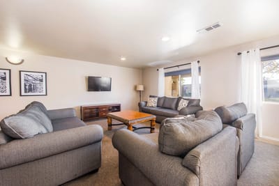 Cozy common area with seating and TV