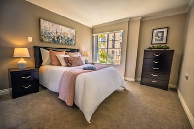 Brightly decorated resident bedroom with flowers