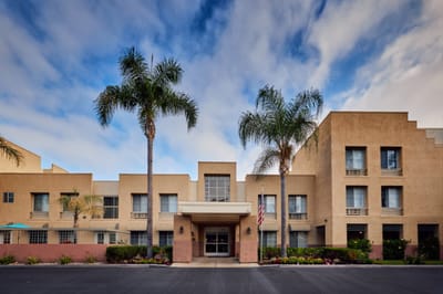 Exterior view of Park Plaza senior living facility