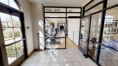 Interior view of a gym area with equipment