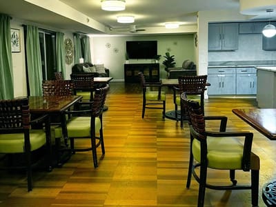 Interior view of a common area with tables and chairs
