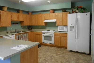 Interior view of a kitchen in a senior living apartment