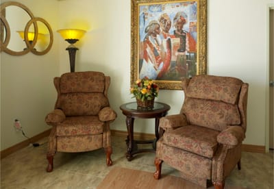 Cozy seating area with artwork in a common space