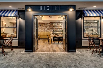 Entrance to a bistro with outdoor seating
