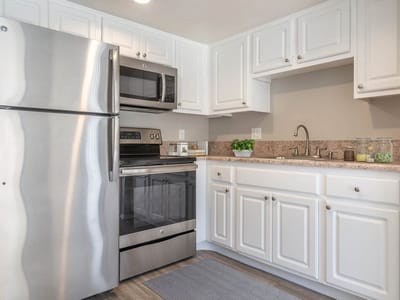 Bright kitchen area with modern appliances