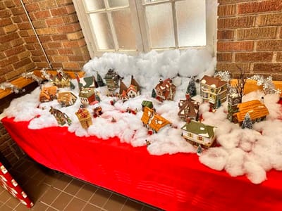 Decorative display of a miniature snowy village for festivities
