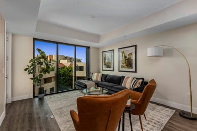 Modern common area with seating and large windows