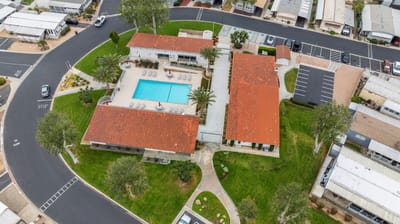 Aerial view of assisted living facility with pool