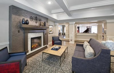 Cozy common area with a fireplace and seating
