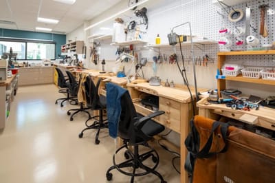 Craft workshop with tools and workstations