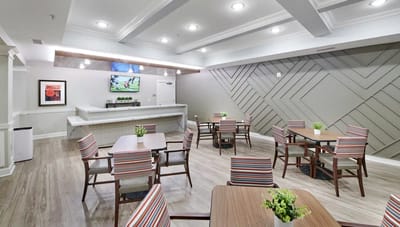 Dining area with chairs and tables in a common room