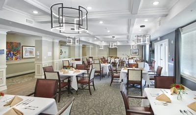 Bright dining room filled with tables and chairs