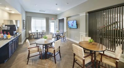 Common area with seating and a television