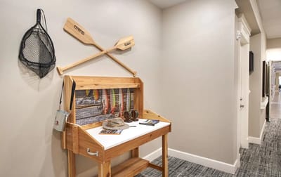 Decorative hallway setup with fishing gear