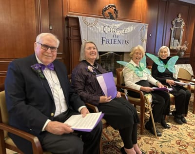 Residents participating in a themed event in a common area