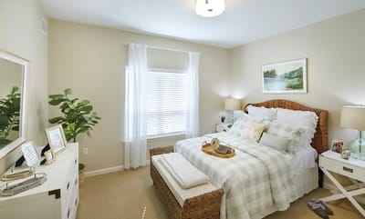 Cozy private room with a bed and decorative elements