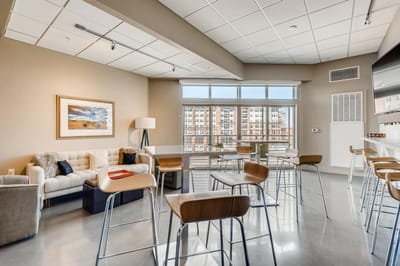 Common area with seating and large windows