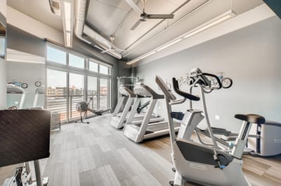Well-equipped fitness area in a senior living facility