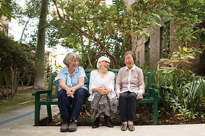 Residents enjoying time together in a garden