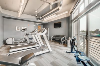Interior fitness room with exercise equipment