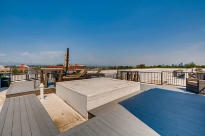 Outdoor rooftop lounge area with seating