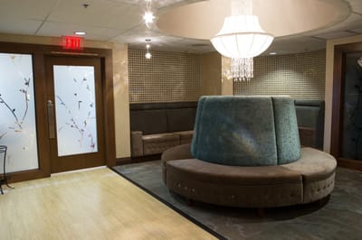 Cozy common area with unique seating and lighting