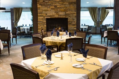 Dining area with tables set for a meal