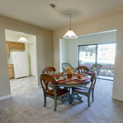 Bright dining area with a table and chairs