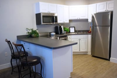 Bright kitchen area with modern appliances
