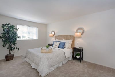 Well-decorated private bedroom in a senior living space