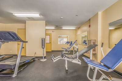 Interior view of a fitness area with exercise equipment