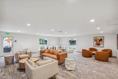 Modern common area with seating and artwork