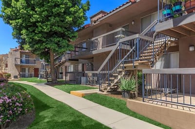 Exterior view of Villa Serena Senior Apartments with landscaping