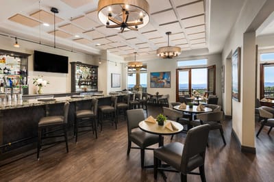 Elegant dining area with bar and scenic views
