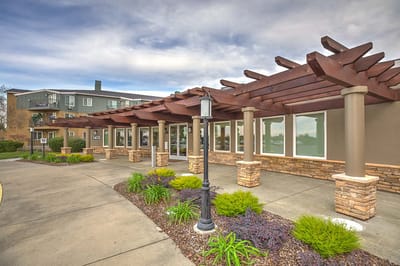 Exterior view of the facility entrance with landscaping