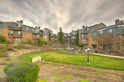 Outdoor area with residential buildings and gardens